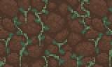 Small vines growing on a dirt background