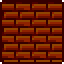 Mur de briques en mousse de lave placé